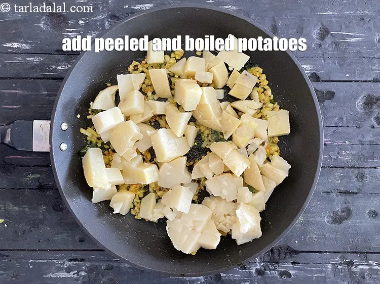 Step 57 – Add&nbsp;<meta charset="UTF-8" />2 cups&nbsp;peeled and&nbsp;<a href="glossary-boiled-potato-cubes-2312i">boiled potato cubes</a>.