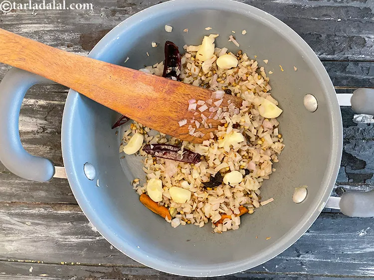 Step 23 – Dry roast on a medium flame for 4 to 5 minutes or till the onions …