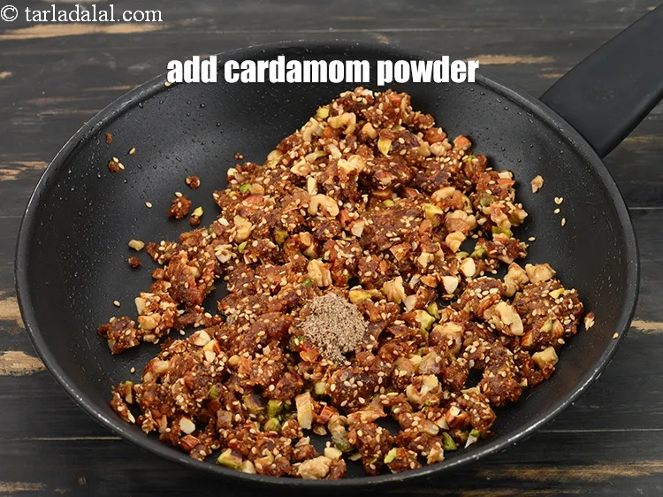 Step 14 – Add &frac14; tsp <a href="https://www.tarladalal.com/glossary-cardamom-powder-elaichi-powder-265i">cardamom (elaichi) powder</a>.