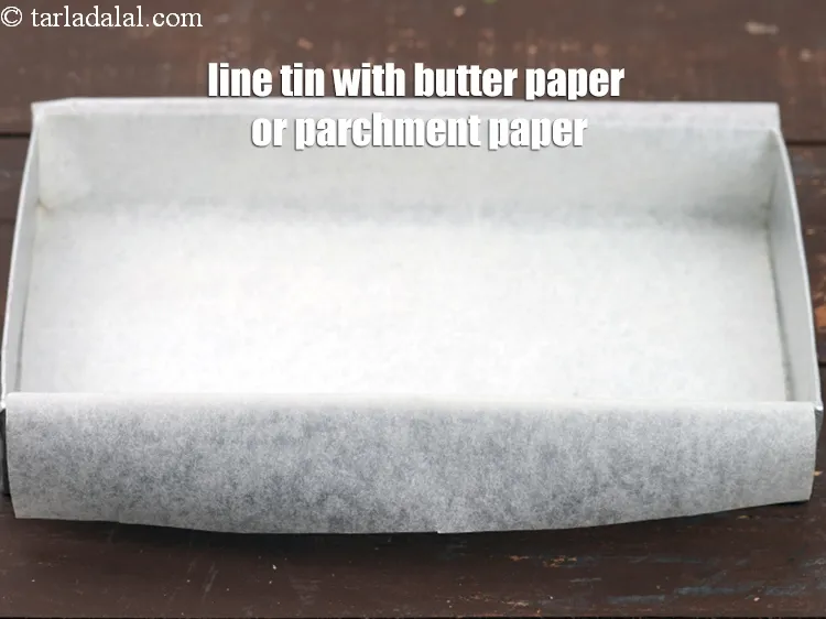 Step 33 – Make sure to keep the excess parchment paper in the tin which becomes easier to …