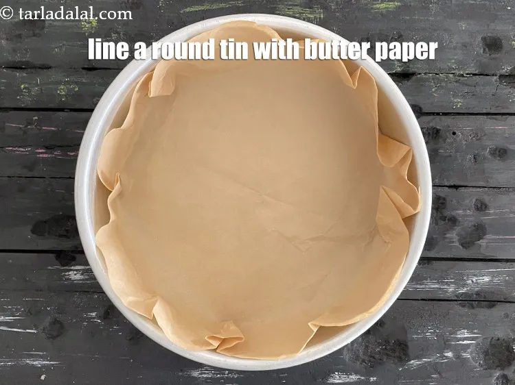 Step 22 – Line a round tin or tray with &nbsp;butter paper.