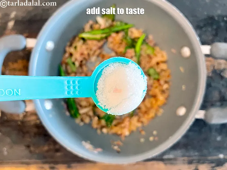 स्टेप 21 – स्वादानुसार नमक डालें। हमने टी-स्पून नमक डाला है।
