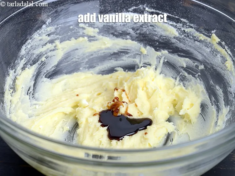 Step 14 – Add 1 tsp <a href="https://www.tarladalal.com/glossary-vanilla-extract-1248i">vanilla extract</a>.