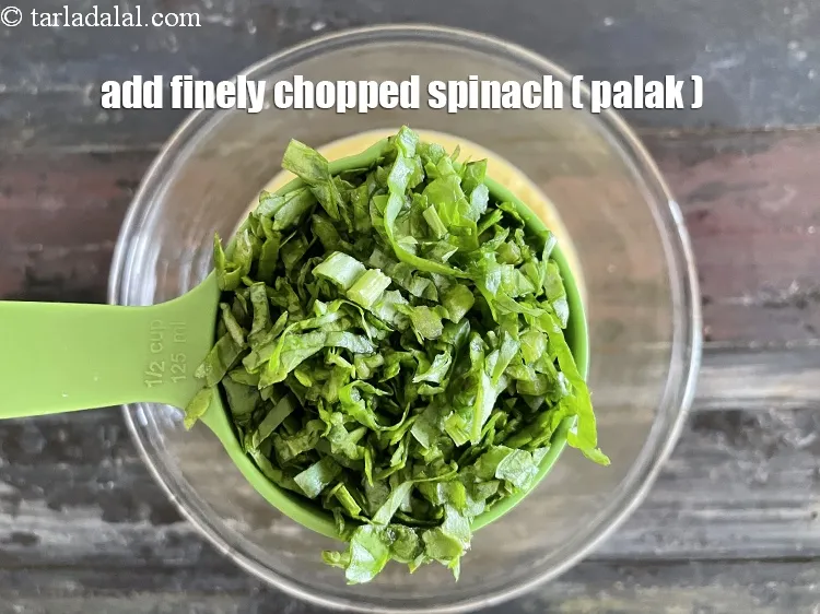 Step 15 – Add&nbsp;<meta charset="UTF-8" />1/2 cup&nbsp;finely&nbsp;<a href="glossary-chopped-spinach-780i">chopped spinach (palak)</a>.