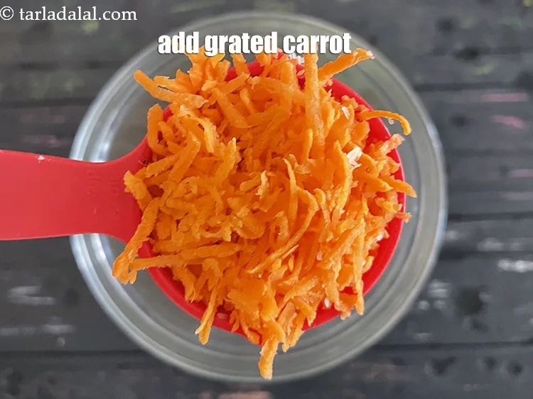 Step 14 – Add&nbsp;<meta charset="UTF-8" />1/4 cup&nbsp;<a href="glossary-grated-carrot-816i">grated carrot</a>.