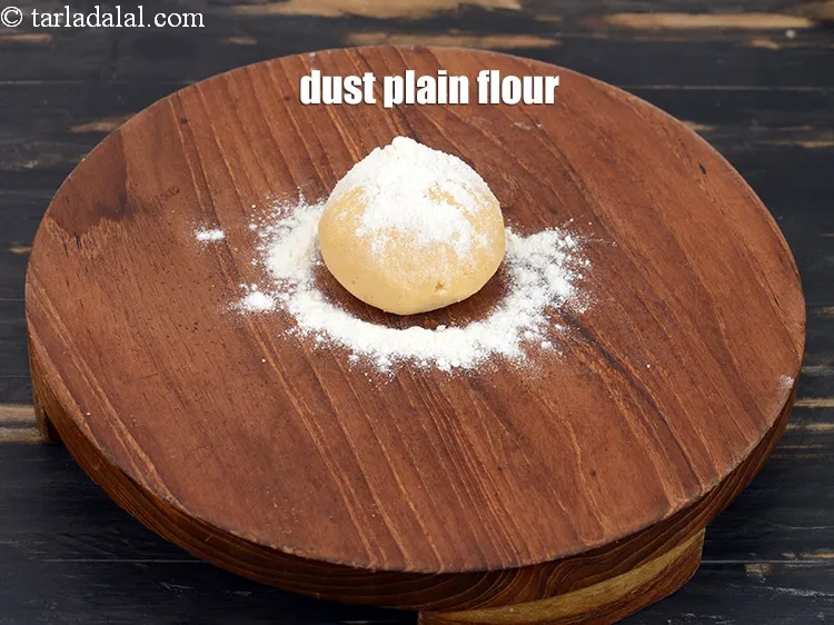 Step 14 – Dust some plain flour.