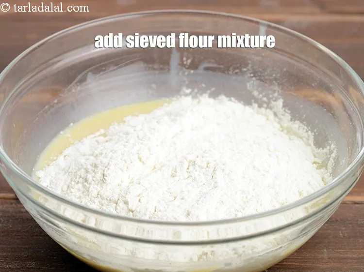 Step 14 – Add the seived flour mixture.