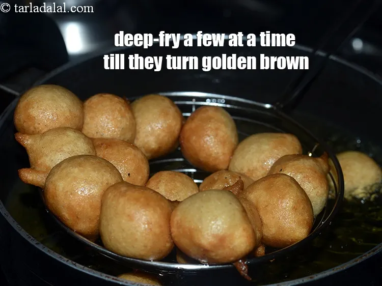 Step 13 – Deep-fry a few at a time on a medium flame, till they turn golden brown …