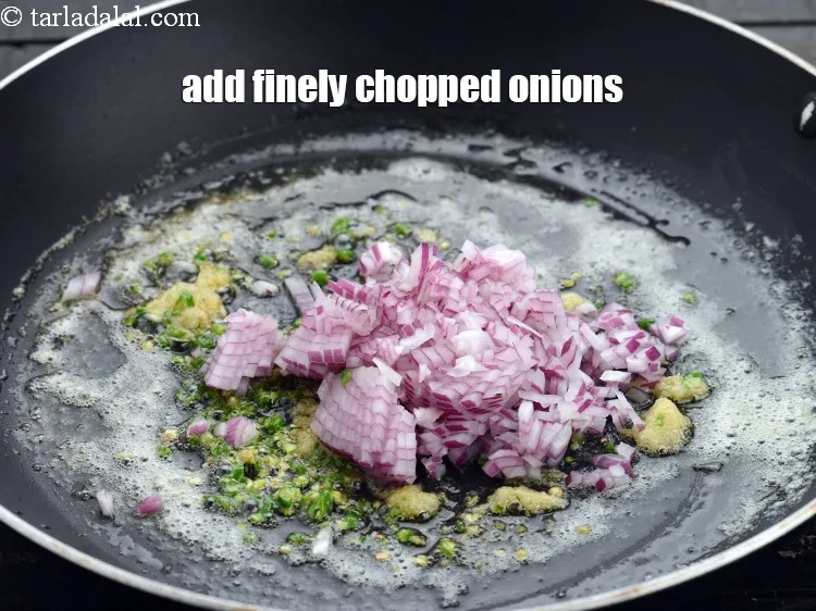 Step 14 – Add 1/4 cup&nbsp;finely&nbsp;<a href="https://www.tarladalal.com/glossary-chopped-onions-722i">chopped onions</a>.