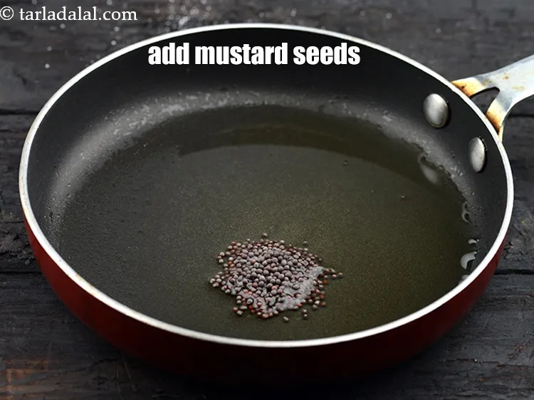 Step 14 – Add&nbsp;1/2 tsp&nbsp;<a href="https://www.tarladalal.com/glossary-mustard-seeds-sarson-rai-sarson-ke-beej-525i">mustard seeds ( rai / sarson)</a>.