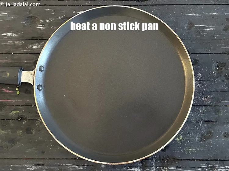 Step 14 – Heat a non-stick tava (griddle).