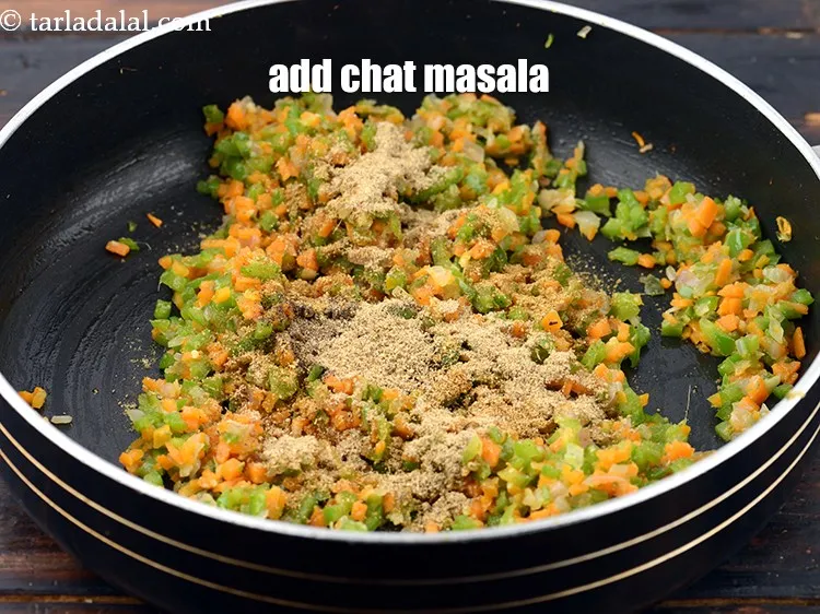 Step 14 – Add&nbsp;1 tsp chat masala<span style="font-size:11pt"><span style="font-family:Calibri,sans-serif">.</span></span>