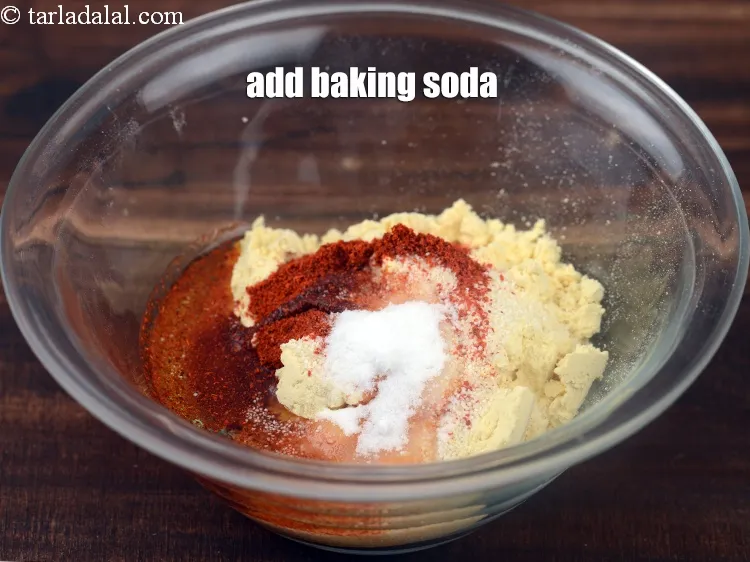 Step 17 – Add &frac14; tsp <a href="https://www.tarladalal.com/glossary-baking-soda-soda-bi-carb-615i">baking soda</a>.