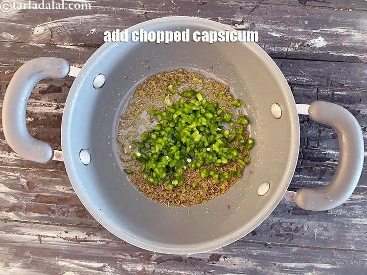 Step 21 – Add&nbsp;<meta charset="UTF-8" />1/4 cup&nbsp;finely&nbsp;<a href="glossary-chopped-capsicum-164i">chopped capsicum</a>.