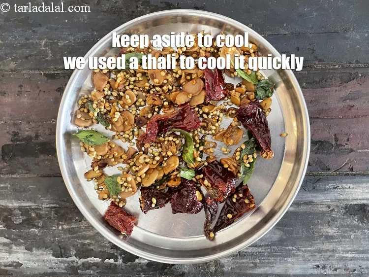Step 14 – Keep aside to cool. We used a thali to cool it quickly.