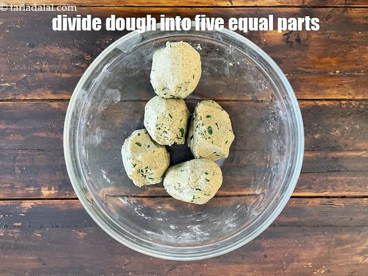 Step 35 – <meta charset="UTF-8" />To make the&nbsp;<strong>whole wheat khakhra</strong>, divide the dough into 5&nbsp;equal portions