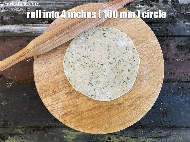Step 16 – Roll out a portion of the dough into a 100&nbsp;mm. (4&quot;) diameter thin circle using …
