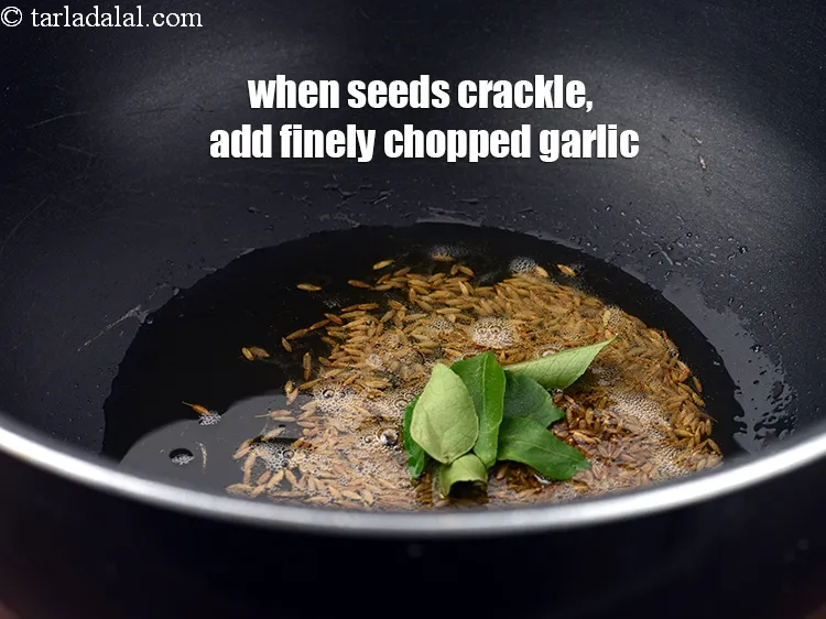 Step 15 – Add 5 to 6&nbsp;<a href="https://www.tarladalal.com/glossary-curry-leaves-kadi-patta-kadipatta-388i">curry leaves (kadi patta)</a>.