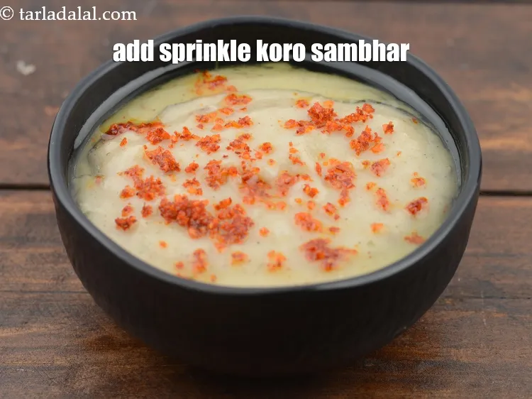 Step 14 – Add sprinkle koro sambhar.