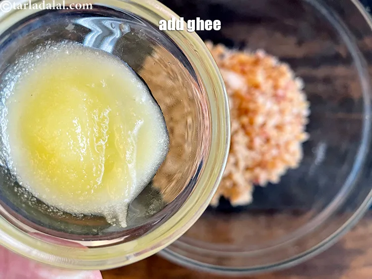 स्टेप 59 – बचा हुआ १ टेबल-स्पून घी डालें।