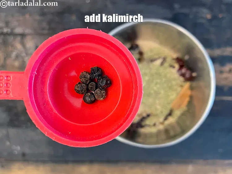 Step 32 – Add&nbsp;<meta charset="UTF-8" />6 to 7&nbsp;<a href="glossary-black-peppercorns-kali-mirch-kalimirch-566i">black peppercorns (kalimirch)</a>.