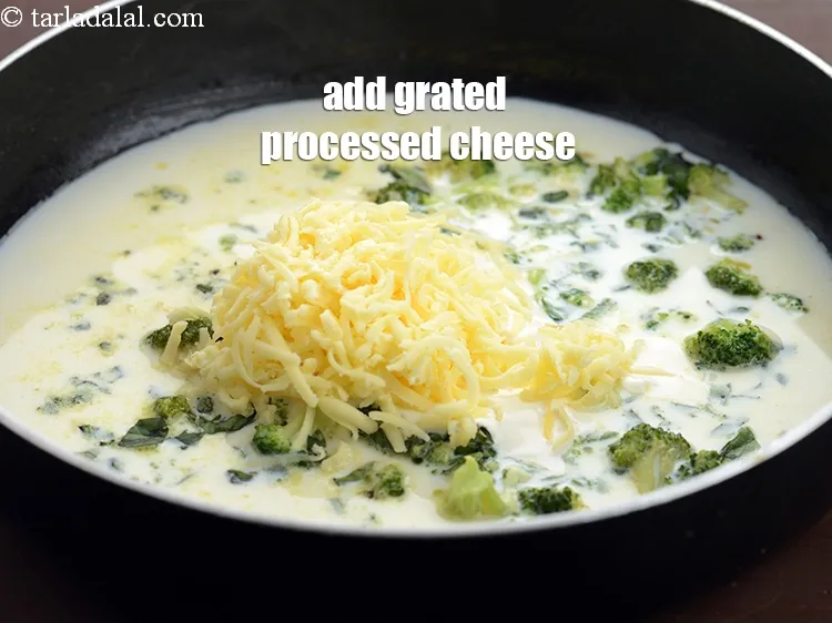 Step 14 – Add 1/2 cup&nbsp;<a href="https://www.tarladalal.com/glossary-grated-processed-cheese-868i">grated processed cheese</a>.