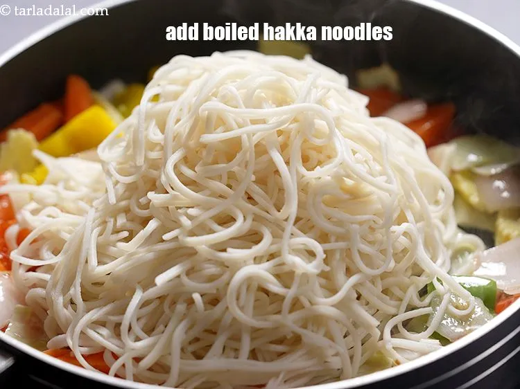Step 22 – Add 2 cups&nbsp;<a href="https://www.tarladalal.com/glossary-boiled-hakka-noodles-2309i">boiled hakka noodles</a>.&nbsp;