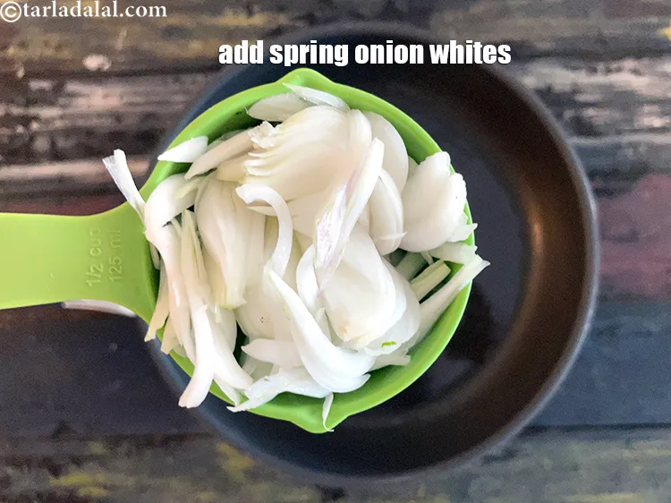 Step 14 – Add&nbsp;<meta charset="UTF-8" />1/2 cup&nbsp;thinly&nbsp;<a href="glossary-sliced-spring-onion-whites-818i">sliced spring onions whites</a>.
