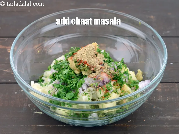 Step 15 – Add 1/4 tsp&nbsp;<a href="https://www.tarladalal.com/glossary-chaat-masala-300i">chaat masala</a>.