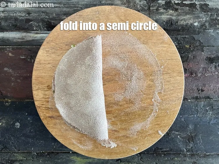 Step 19 – Fold it over to make a semi-circle.