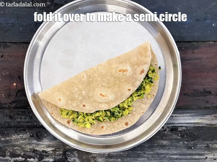 Step 32 – Fold it over to make a semi-circle.