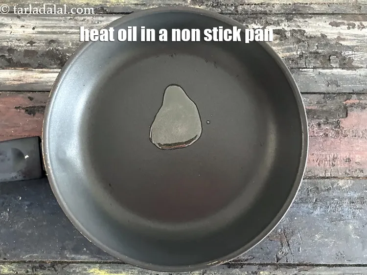 Step 16 – Heat 1 tsp oil in a non stick pan.