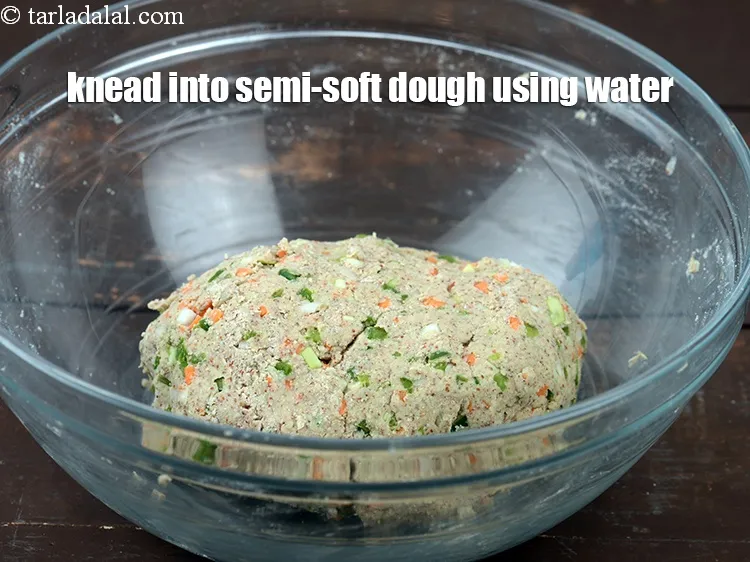 Step 14 – Knead into a semi-soft dough using approx. &frac12; cup of water.