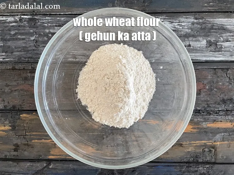 Step 15 – In a deep bowl put&nbsp;<meta charset="UTF-8" />1 cup&nbsp;<a href="glossary-whole-wheat-flour-gehun-ka-atta-gehun-ka-aata-429i">whole wheat flour (gehun ka atta)</a>.