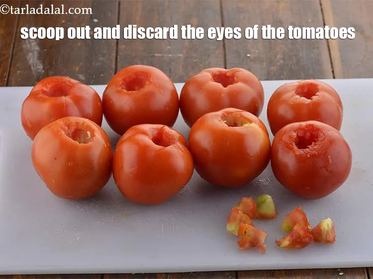 Step 14 – Scoop out and discard the eyes of the tomatoes using the tip of a sharp …