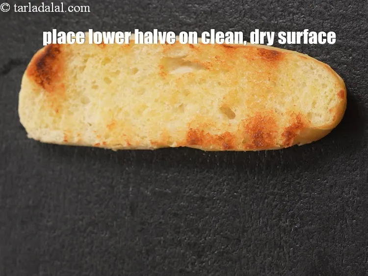 Step 14 – Place the lower halve of the hot dog roll on a clean, dry surface.&nbsp;