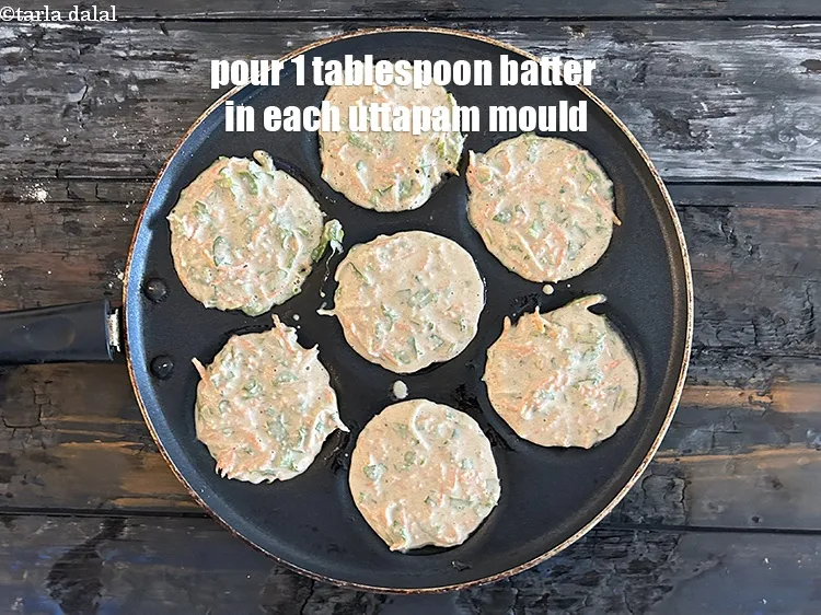 Step 14 – Pour 1 tbsp of the batter into each uttapam mould.