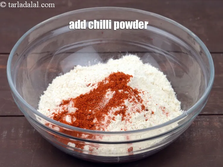 Step 13 – Add 1 tsp <a href="https://www.tarladalal.com/glossary-chilli-powder-red-chilli-powder-339i">chilli powder</a>.