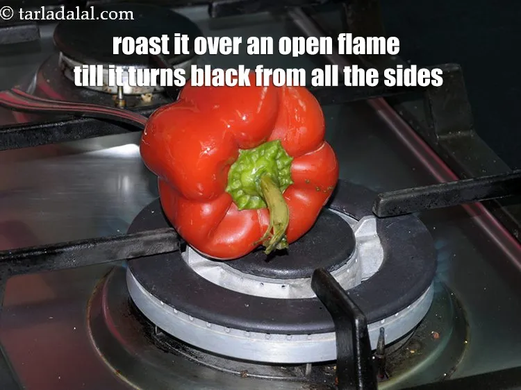 Step 15 – Roast it over an open flame till it turns black from all the sides.