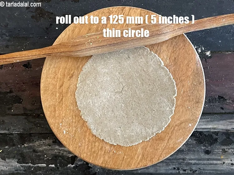 Step 14 – Roll each on a floured surface into a 125 mm. (5&quot;) diameter thin circle.
