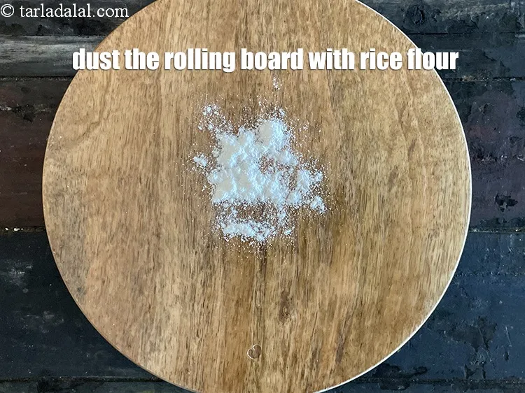 Step 14 – <p>Dust the rolling board with a little rice flour.</p>