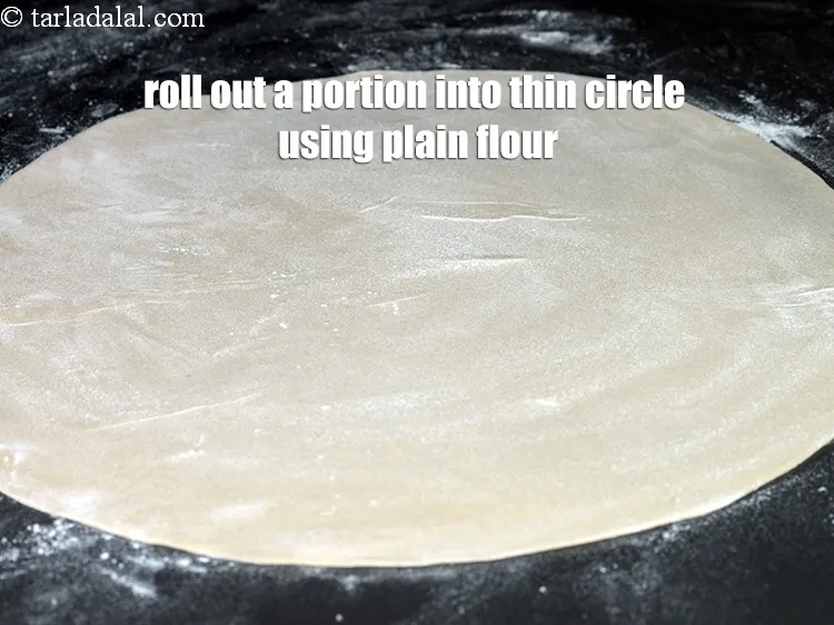 Step 15 – Roll out each portion into 12&quot; diameter thin circle using plain flour for rolling.
