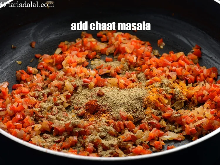 Step 14 – Add 1 tsp <a href="https://www.tarladalal.com/glossary-chaat-masala-300i">chaat masala</a>.
