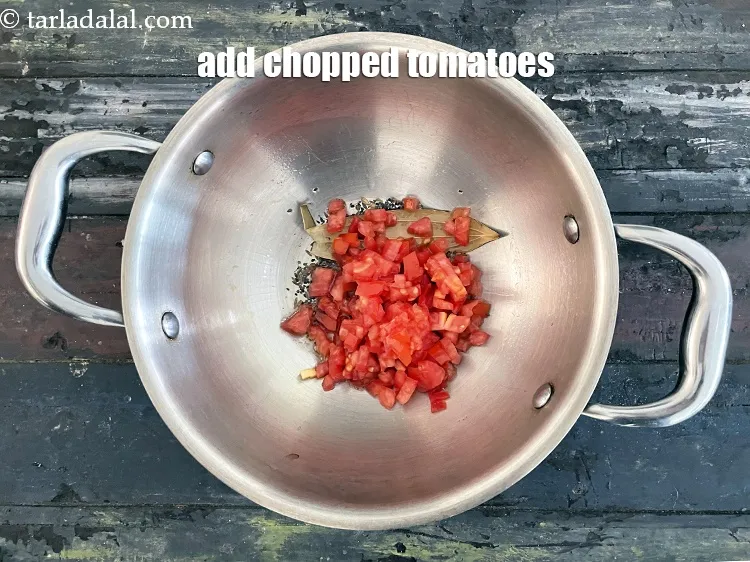 Step 22 – Add&nbsp;<meta charset="UTF-8" />1/2 cup&nbsp;<a href="glossary-chopped-tomatoes-779i">chopped tomatoes</a>.
