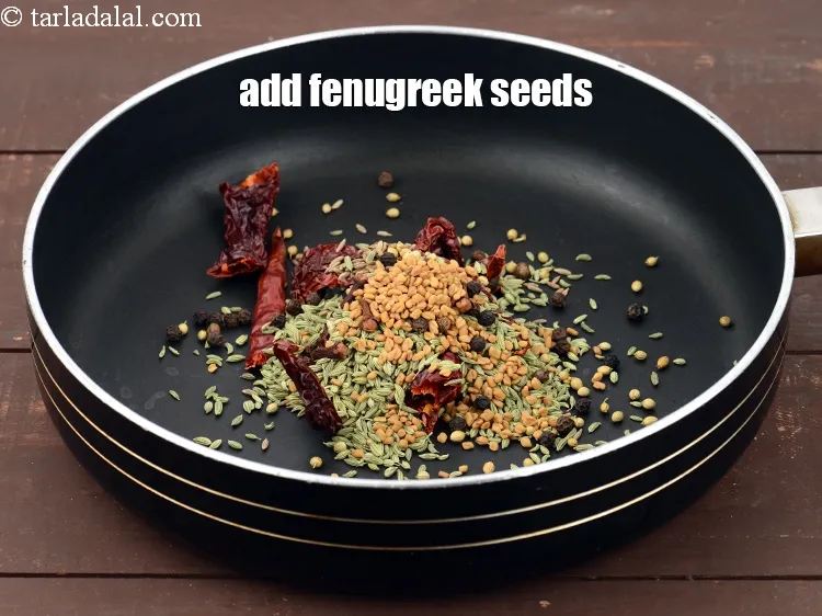Step 15 – Add 1 tsp <a href="https://www.tarladalal.com/glossary-fenugreek-seeds-methi-dana-methi-ke-dane-methi-seeds-991i">fenugreek (methi) seeds</a>.