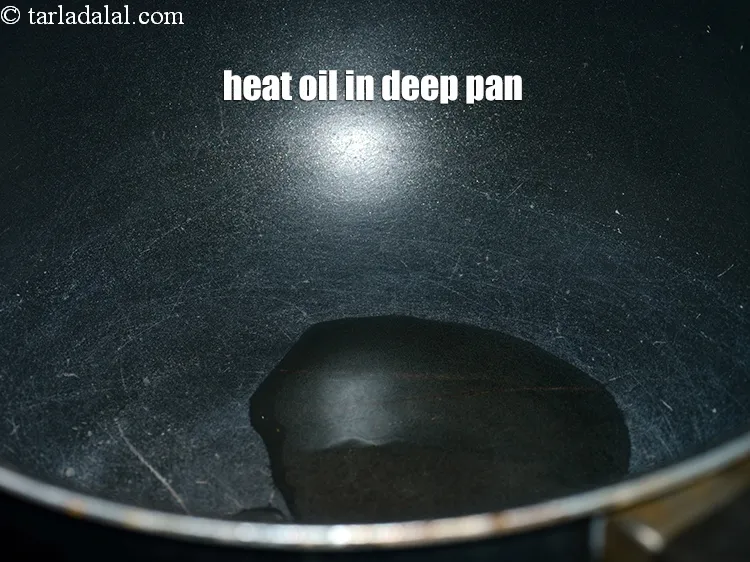 Step 15 – Heat 2 tsp oil in a deep non-stick pan.