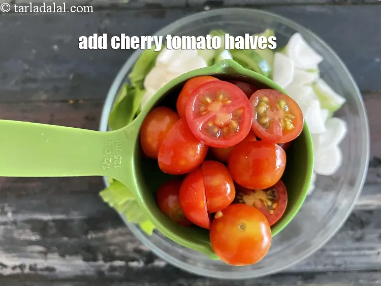 Step 26 – Add&nbsp;<meta charset="UTF-8" />1/2 cup&nbsp;<a href="glossary-cherry-tomato-halves-2464i">cherry tomato halves</a>.