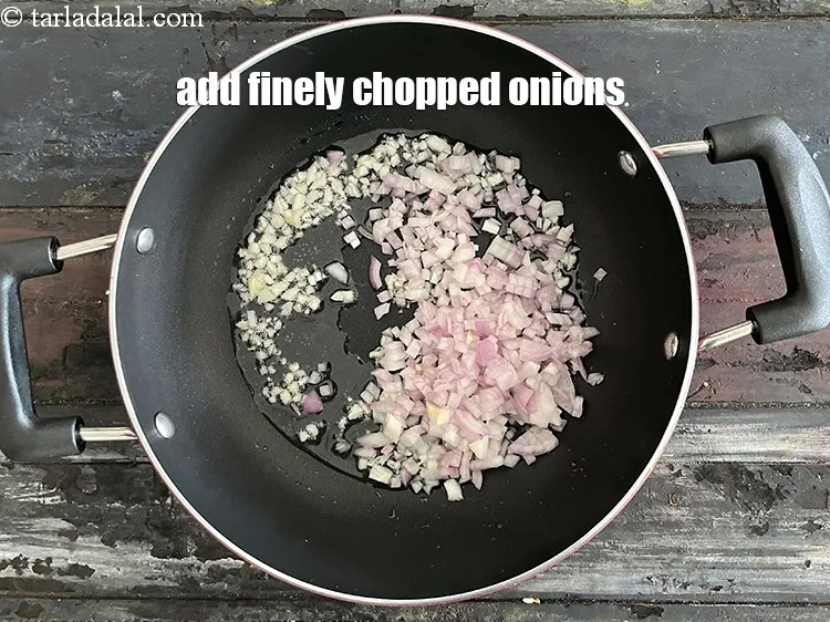 Step 21 – Add&nbsp;<meta charset="UTF-8" /><strong>1/2&nbsp;cup</strong>&nbsp;finely&nbsp;<a href="glossary-chopped-onions-722i">chopped onions</a>.