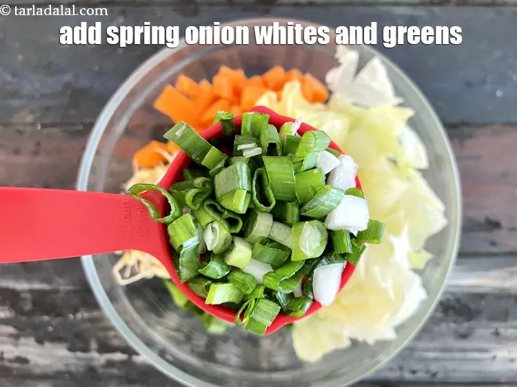 Step 21 – Add&nbsp;<meta charset="UTF-8" />1/4 cup&nbsp;<a href="glossary-chopped-spring-onion-greens-1030i">chopped spring onion greens</a>.