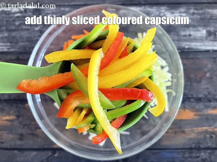 Step 16 – <meta charset="UTF-8" /> Add 1/4 cup&nbsp;thinly&nbsp;<a href="https://www.tarladalal.com/glossary-sliced-capsicum-165i">sliced capsicum</a>.